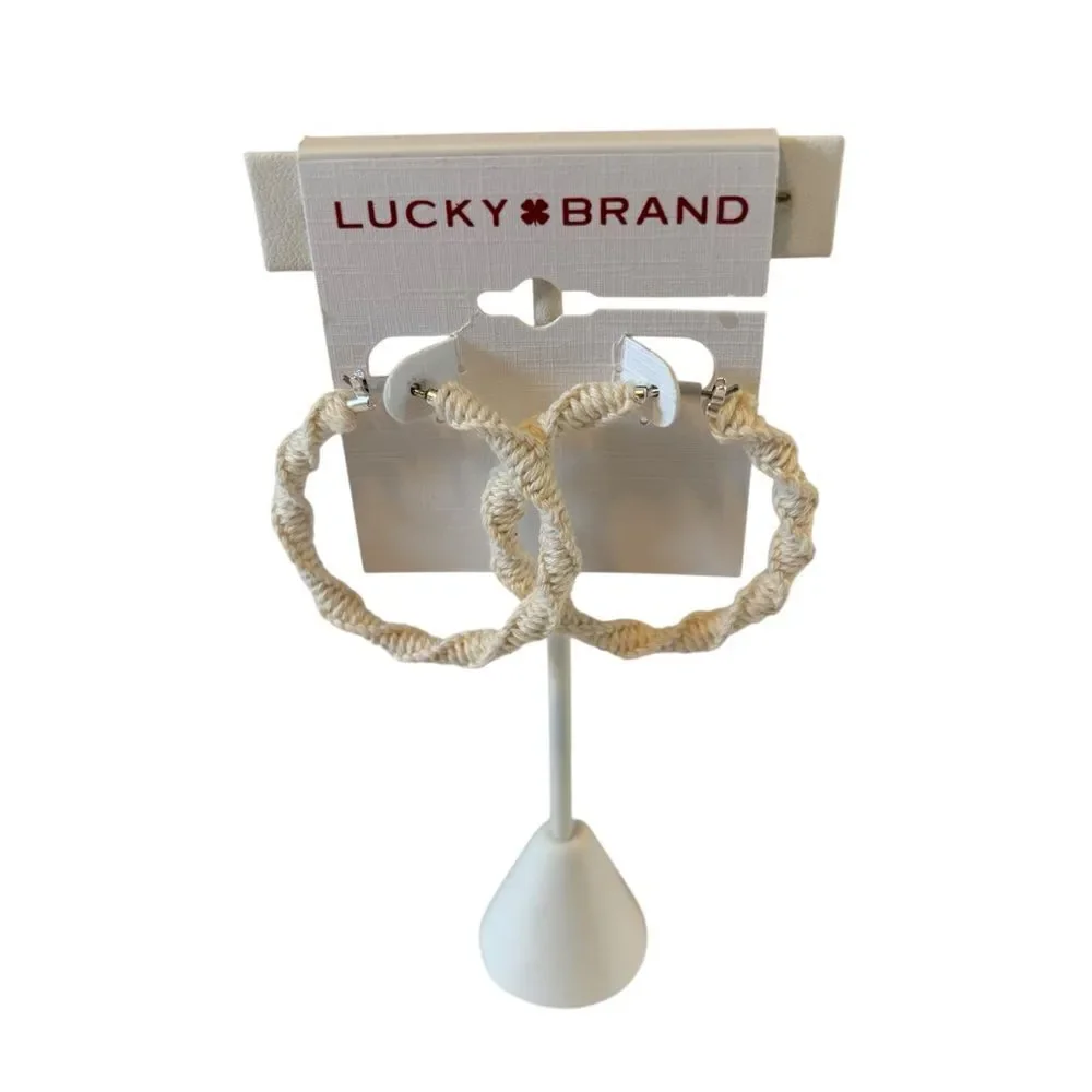 Off White Woven Hoop Earrings. Great Neutral Color that will go with so much!